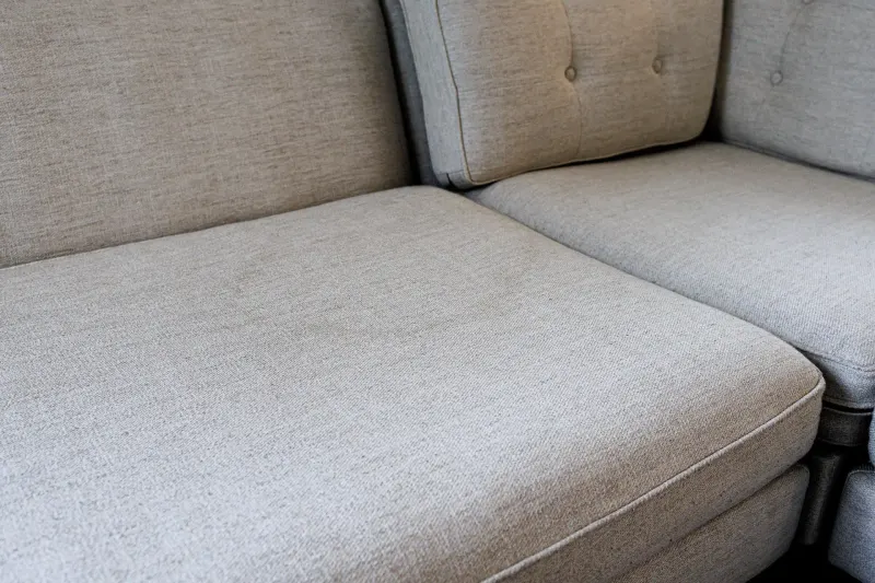 Much-used sofa seat evenly clean after extraction