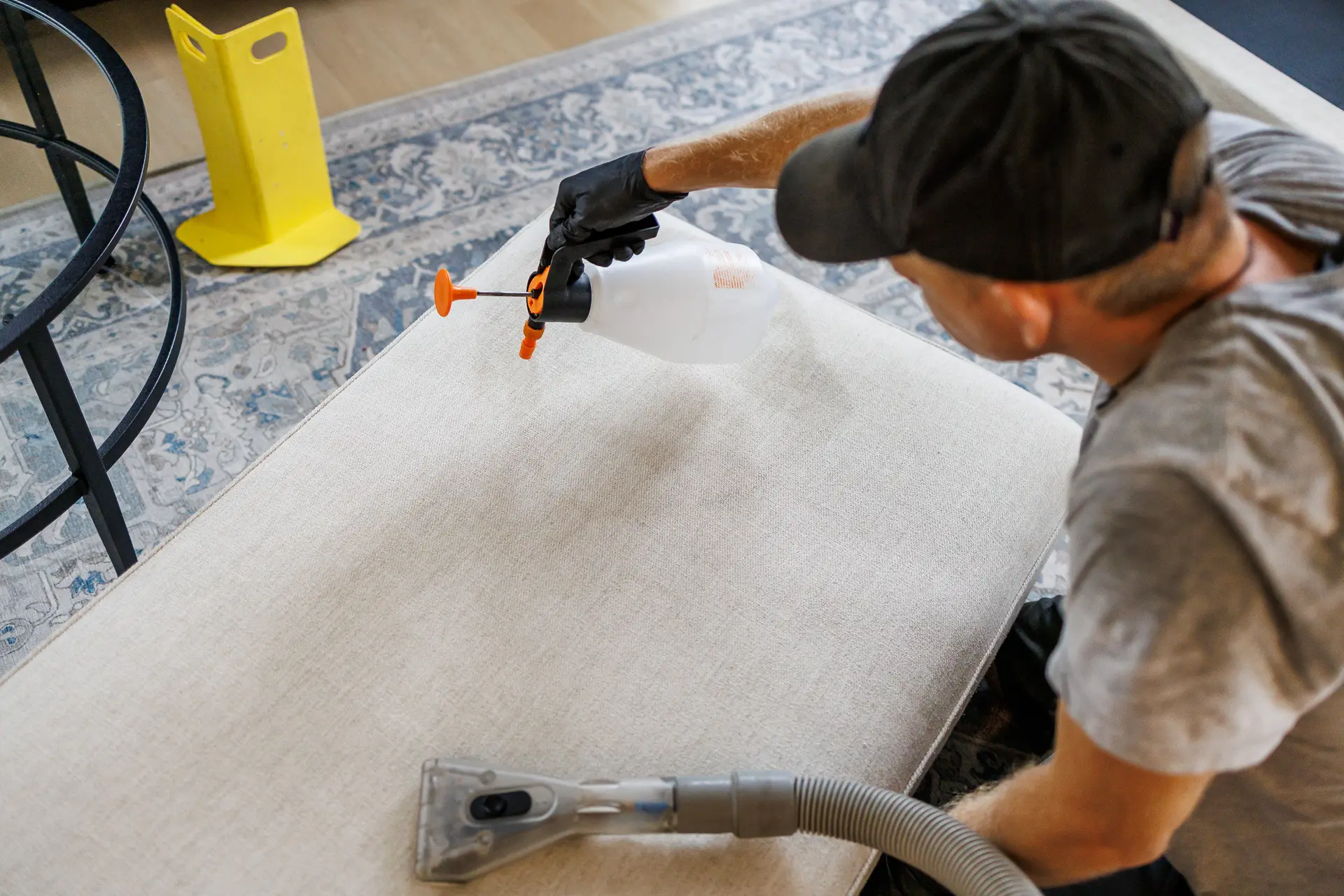 Premier Carpet Service team preparing fabric protection treatment